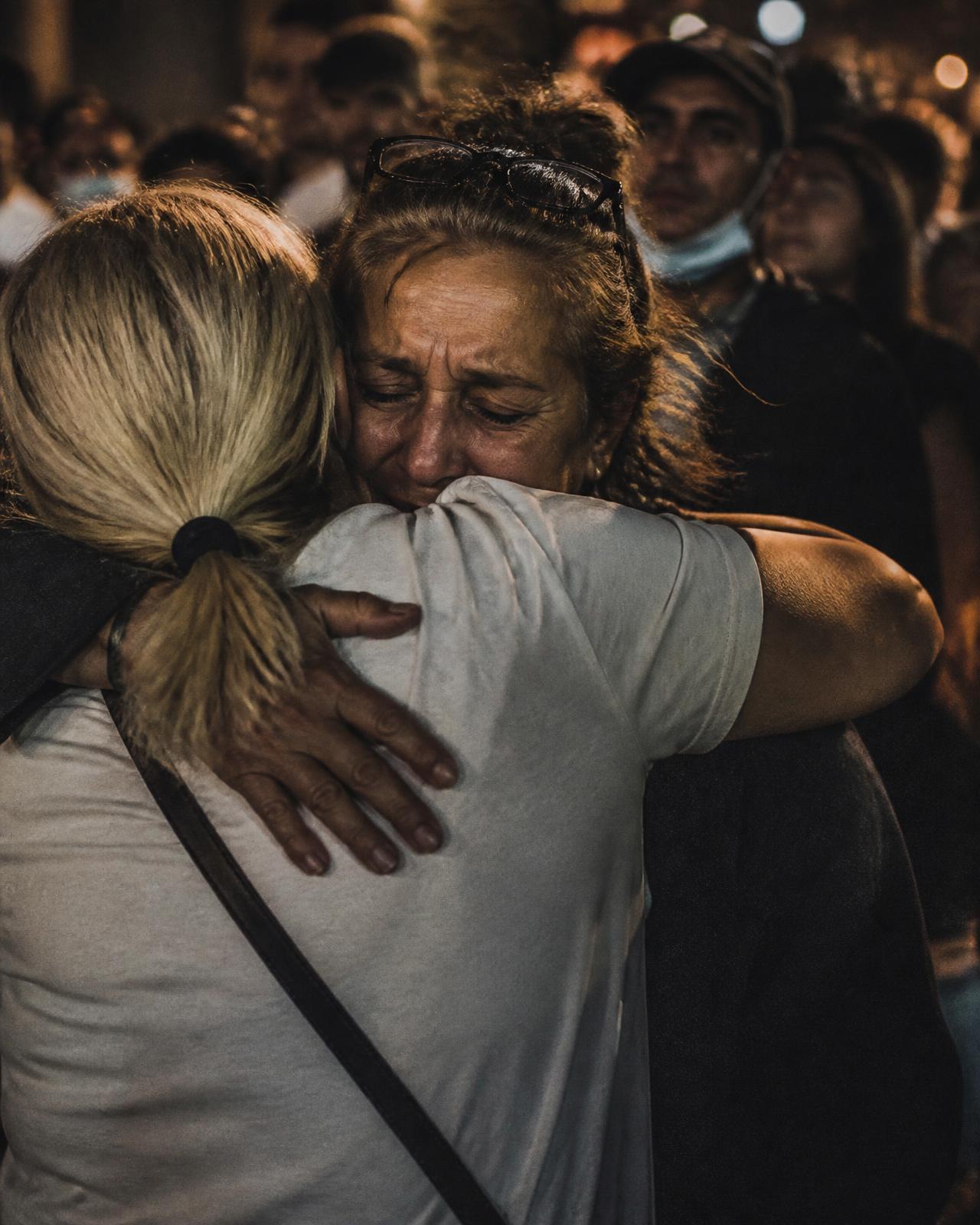 Two people embracing after an emotional moment